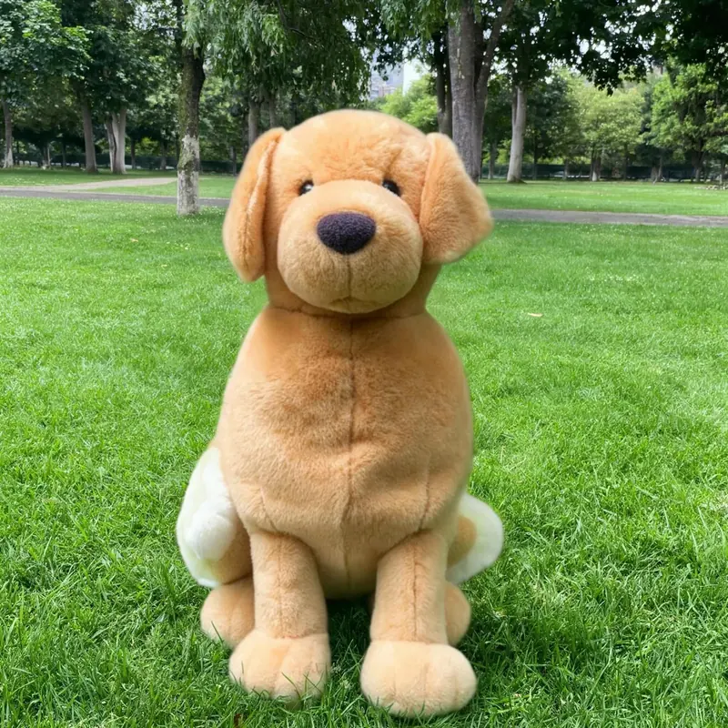 FLUX 3 Klein example: Turn the dog into a soft plush toy with the same pose and colors, sitting on the